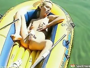 A blonde teenage girl is in a protection boat on the river, paddling about. She lifts up her t-shirt and plays with her small tits. Then she eliminates her shorts and panties, spreads her legs as broad as she can and jerks wildly.